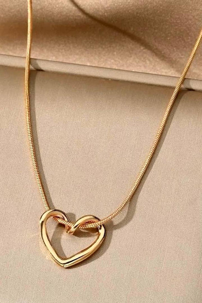 Twisted Heart Pendant Necklace – Gold Tone